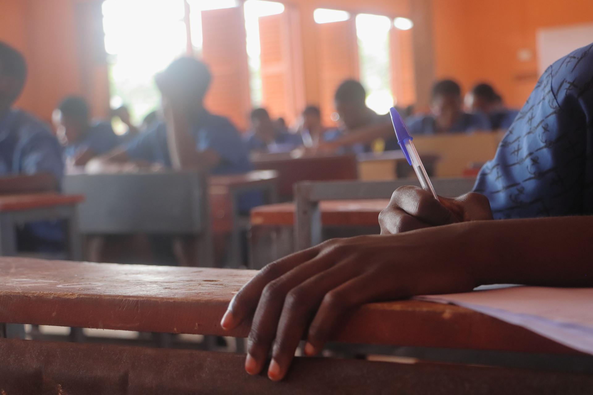 Future Minds: Diligent Ghanaian Student During National Exams